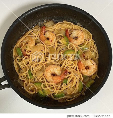 Gambas spaghetti with succulent shrimp, garlic, olive oil, and chili flakes—a perfect fusion of seafood richness and Italian flavor in every bite. Gambas spaghetti with succulent shrimp, garlic, olive oil, and chili flakes—a perfect fusion of seafood richness and Italian flavor in every bite. 133594636