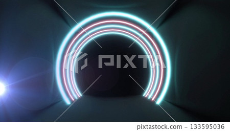 Glowing concentric cyan and magenta neon arches illuminating dark corridor, with lens flare beams 133595036