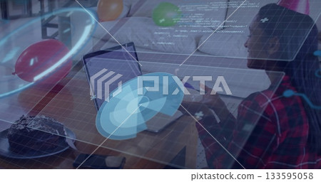 Working woman in plaid shirt viewing AR at home, with laptop mug cake balloons, copy space 133595058