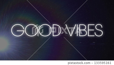 Glowing neon GOOD VIBES text creating cosmic atmosphere in dark backdrop, with lens flare effect 133595161