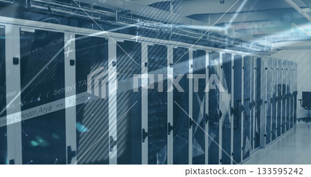 Running server cabinets cooling servers in bright data center aisle, with cable trays 133595242