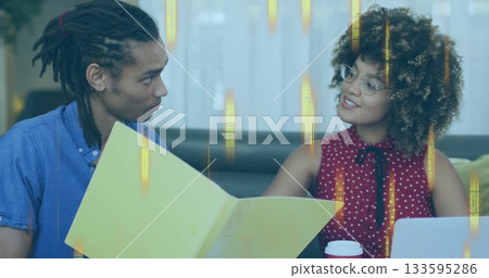 Reviewing document man and woman colleagues consulting in modern office lounge, with yellow folder Reviewing document man and woman colleagues consulting in modern office lounge, with yellow folder 133595286