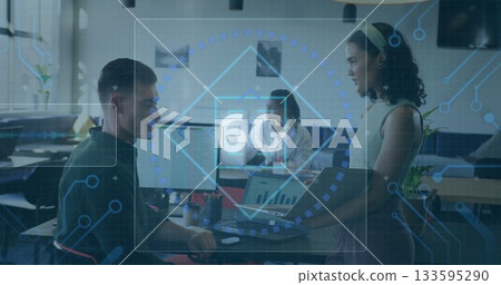 Three professionals analyzing digital 6G overlay in office, holding laptop and pointing at monitor Three professionals analyzing digital 6G overlay in office, holding laptop and pointing at monitor 133595290