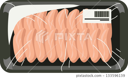 Top view of packaged raw chicken breast slices in sealed plastic tray with barcode label for grocery store 133596139
