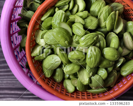 Fresh stink beans (petai) commonly used in southern Thai cuisine. Fresh stink beans (petai) commonly used in southern Thai cuisine. 133596283