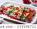 Christmas salmon in pomegranate juice with orange and pomegranate seeds. 133596721