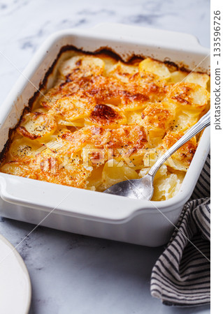 French classic potato gratin dauphinois. French classic potato gratin dauphinois. 133596726