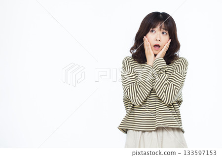 Surprised and amazed woman Surprised and amazed woman 133597153