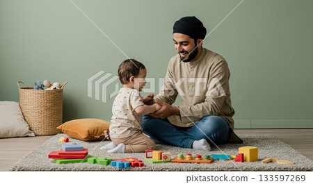 Father and son create strong bond playing with toys. This is happy family bond Father and son create strong bond playing with toys. This is happy family bond 133597269