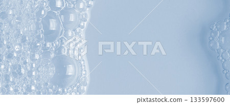 Bubbles of body gel or soap foam or shaving gel. Closeup. Copy space 133597600