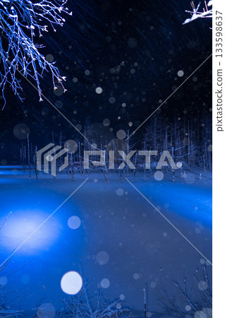 The spectacular winter scenery of Shirogane Onsen's illuminated Blue Pond The spectacular winter scenery of Shirogane Onsen's illuminated Blue Pond 133598637