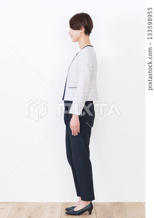 A woman in a formal suit 133598955