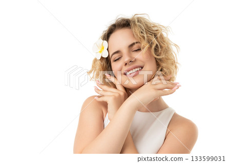 Curly-haired woman smiles, caring for skin, isolated on white, PNG Curly-haired woman smiles, caring for skin, isolated on white, PNG 133599031