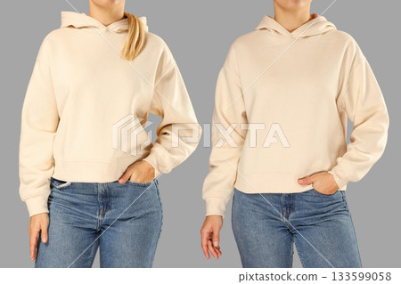 Showcasing two variations of casual beige hoodies worn with jeans 133599058