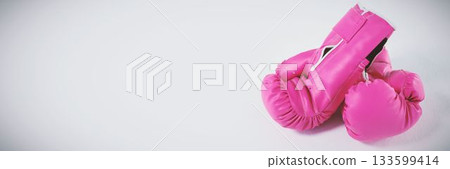 Pink gloves on white background 133599414