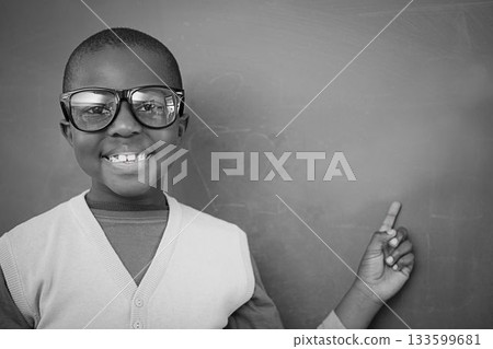 Schoolchild with blackboard 133599681