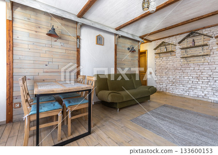 Rustic Dining Area with Wooden Table and Chairs Rustic Dining Area with Wooden Table and Chairs 133600153