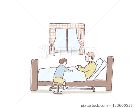 A little boy sits next to his grandmother in bed 133600555