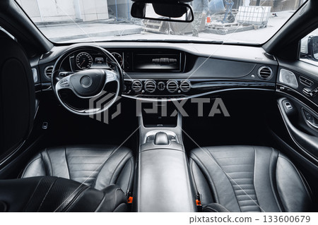 Luxurious car interior with modern design and high-quality materials 133600679