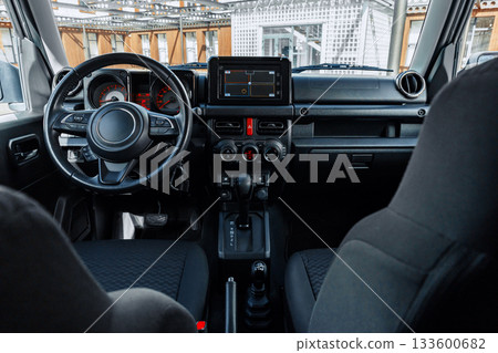 Modern car interior design featuring advanced dashboard and control features Modern car interior design featuring advanced dashboard and control features 133600682