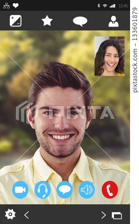 Showing mobile call UI with smiling man and inset woman, status icons, app icons, control icons 133601879