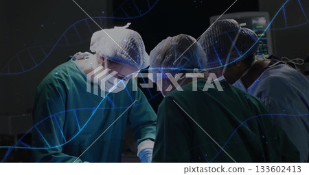 Performing procedure, surgeons wearing scrubs around table with instruments in OR, with DNA overlay Performing procedure, surgeons wearing scrubs around table with instruments in OR, with DNA overlay 133602413