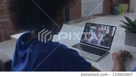 Sitting Black woman blue top joining meeting at office desk, with laptop succulent bins, copy space 133602607