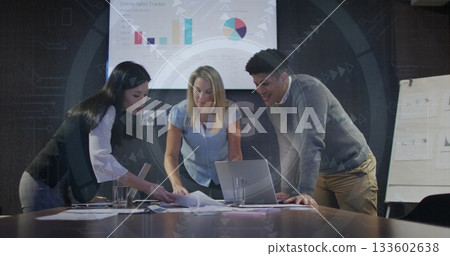 Leaning professionals analyzing online sales data at conference room, with laptop and charts 133602638