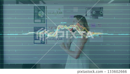 Talking woman in dress reviewing charts on office wall with smartphone, data overlay, copy space Talking woman in dress reviewing charts on office wall with smartphone, data overlay, copy space 133602666