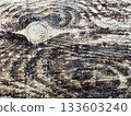 Natural wood background. wood grain texture of sawn timber with slight abrasions and dark areas 133603240
