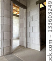 Block walls and unfinished cement floors. The interior of a private house 133603249