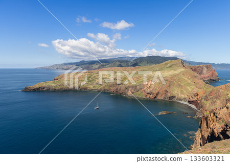 Layered volcanic cliffs and calm bay at Ponta de Sao Lourenco Madeira coastline Layered volcanic cliffs and calm bay at Ponta de Sao Lourenco Madeira coastline 133603321
