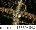 Aerial view of illuminated highway interchange with light trails at night in city of Hangzhou, China 133604648