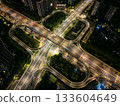 Aerial view of illuminated highway interchange with light trails at night in city of Hangzhou, China 133604649