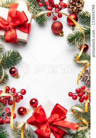 Christmas gifts and ornaments creating festive border 133604766