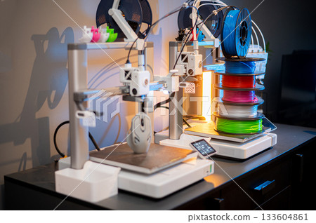 The 3D printing machine operation. The 3D rapid prototype processing concept. 133604861