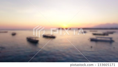Boats moored on sea against clear sky 133605171