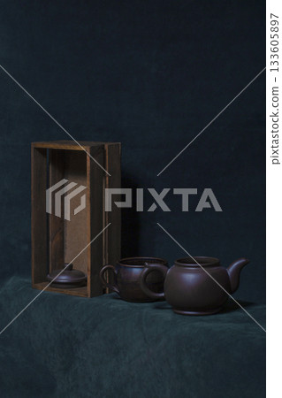 Still life with teapot, cup and wooden box Still life with teapot, cup and wooden box 133605897