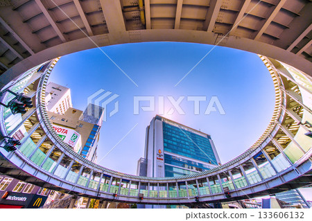 The cityscape of Yokohama, Japan. Shin-Yokohama is making great strides. View of Shin-Yokohama Station and the circular pedestrian bridge. A ray of hope for a new era. (27th) The cityscape of Yokohama, Japan. Shin-Yokohama is making great strides. View of Shin-Yokohama Station and the circular pedestrian bridge. A ray of hope for a new era. (27th) 133606132