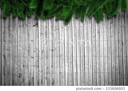 Fir branches on wooden planks Fir branches on wooden planks 133606803