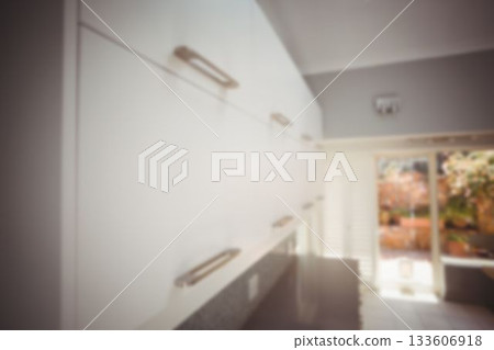 Defocused image of cabinets in kitchen Defocused image of cabinets in kitchen 133606918