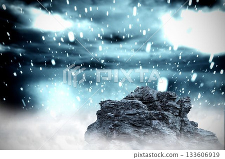 Large rock overlooking snowy sky Large rock overlooking snowy sky 133606919