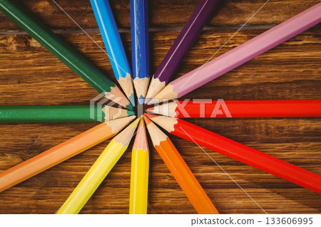 Color pencils arranged on wooden table Color pencils arranged on wooden table 133606995