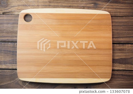Chopping board on hardwood floor 133607078