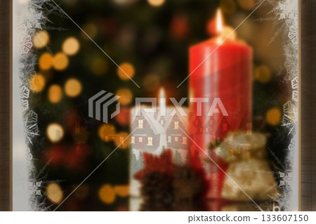 Christmas home seen through frosty window 133607150