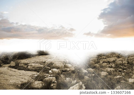 Flat illustration is showcasing arid rocky terrain with slabs, boulders, dry grasses and sun glare 133607166