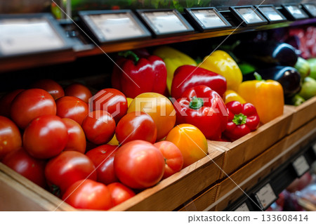 Supermarket vegetables. Fresh vegetables and fruits on supermarket shelves. Supermarket vegetables. Fresh vegetables and fruits on supermarket shelves. 133608414