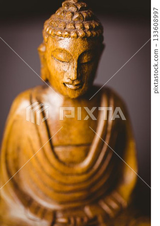 Close-up of Buddha statue 133608997