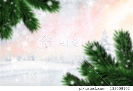 Evergreen branches framing snowy field in flat design with soft sky glowing and drifting snowflakes 133609102