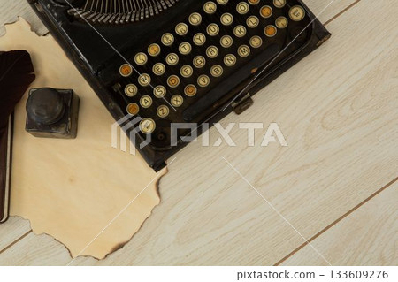 Typewriter and stamp on table Typewriter and stamp on table 133609276